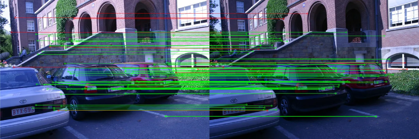 Two photographs of a courtyard and parked cars, side by side, with thin green and red lines drawn between matching points in the two photos. Most lines are green; a handful near the top, on the building's facade, are red.